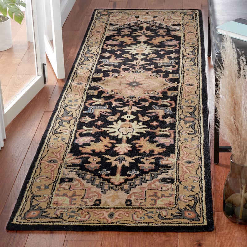 SAFAVIEH Handmade Heritage Carrol Traditional Oriental Wool Rug - 2'3" x 6' Runner - Black/Gold