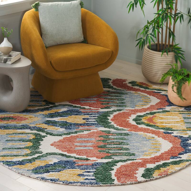 SAFAVIEH Handmade Ikat Katiuscia Bohemian Wool Rug - 6' Round - Green/Rust