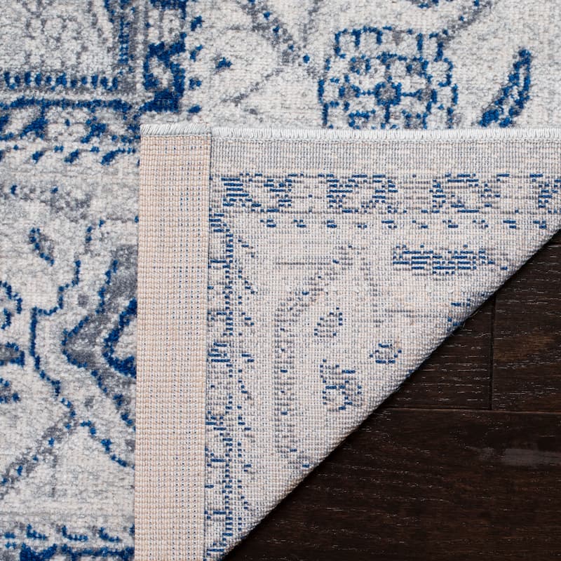 SAFAVIEH Artisan Zhamilja Distressed Oriental Rug