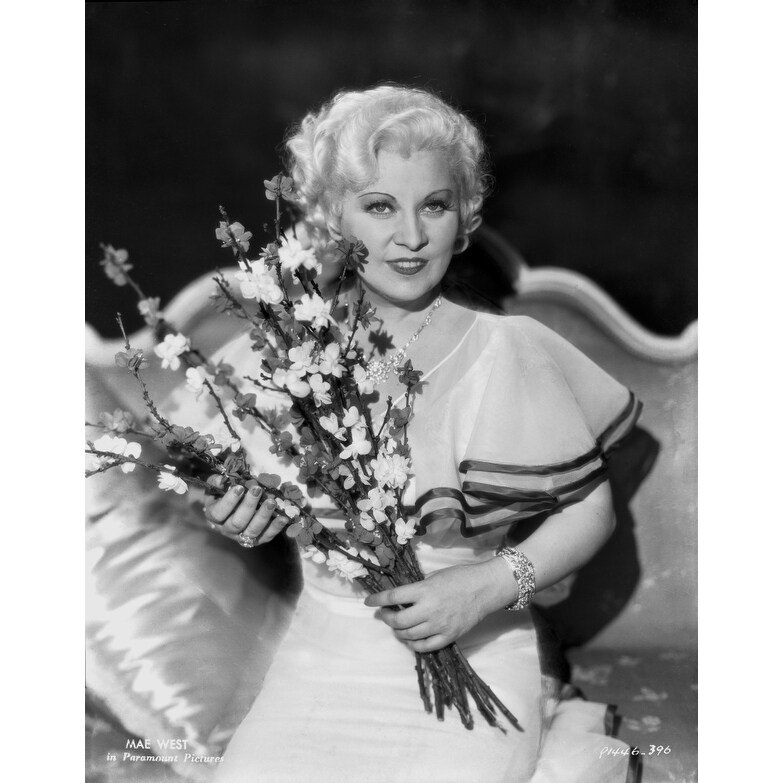 Shop Mae West Smiling In A Couch With Flowers Photo Print Free