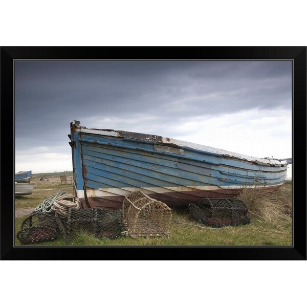 "A Boat And Fishing Traps On The Shore" Black Framed Print