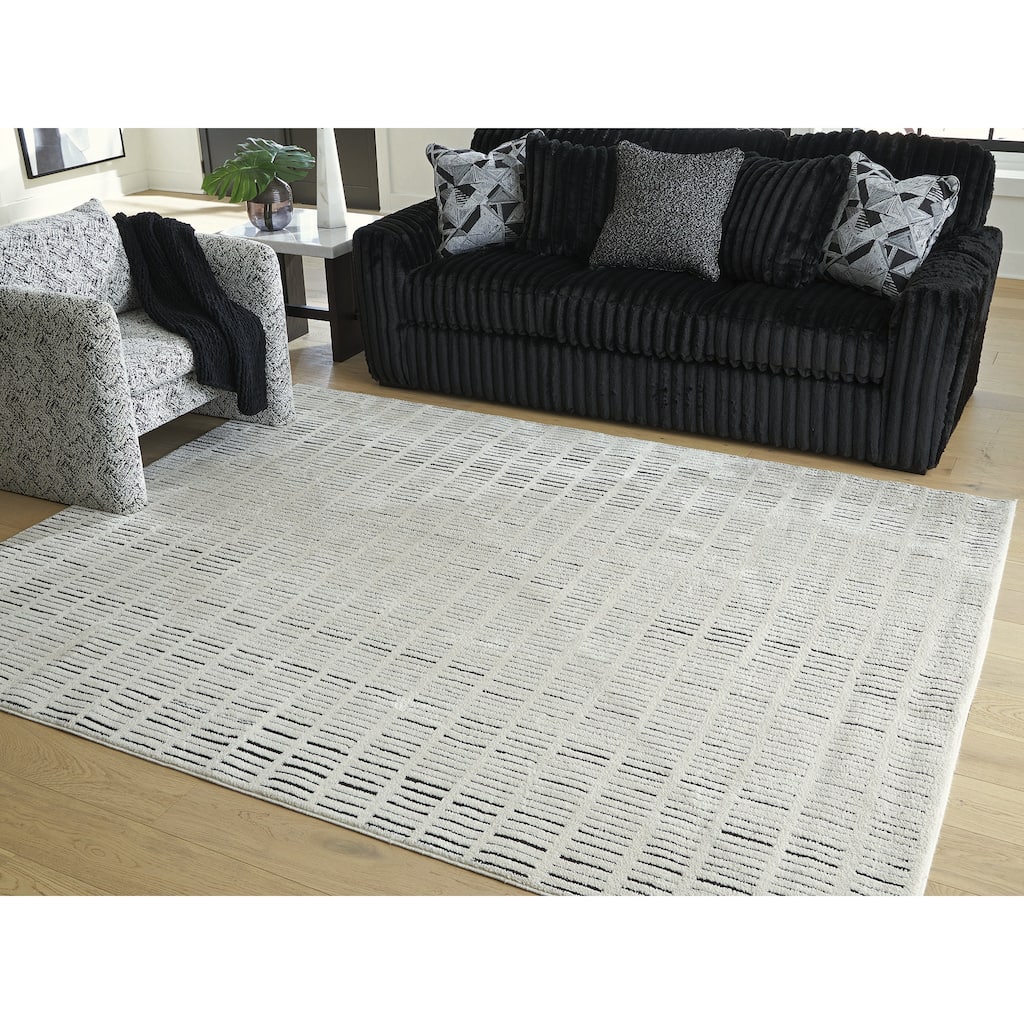 Signature Design by Ashley Turinwith Beige/Black Area Rug