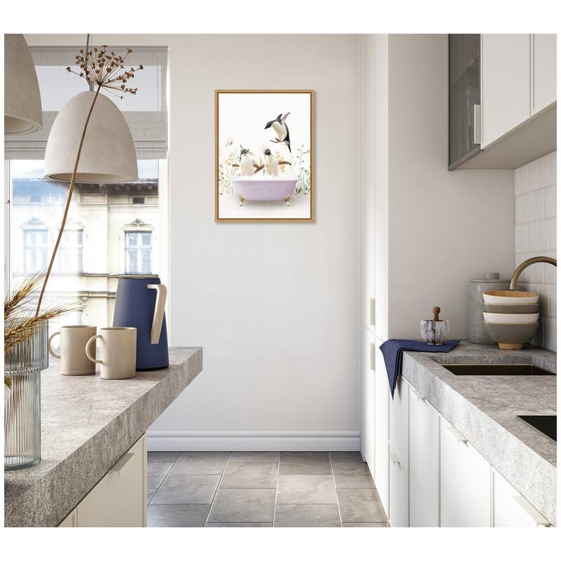 Kate and Laurel Sylvie Penguins in Spring Bathtub Framed Canvas by Amy Peterson