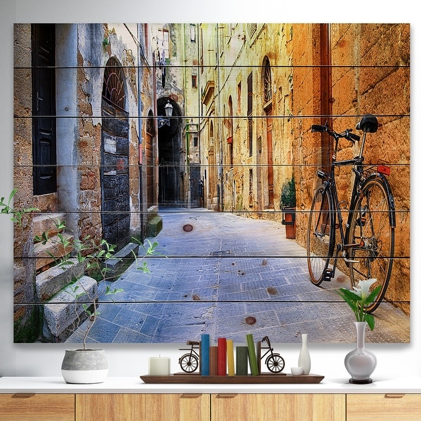 Designart 'Pictorial Street of Old Italy' Cityscape Print on Natural Pine Wood - Yellow. Opens flyout.