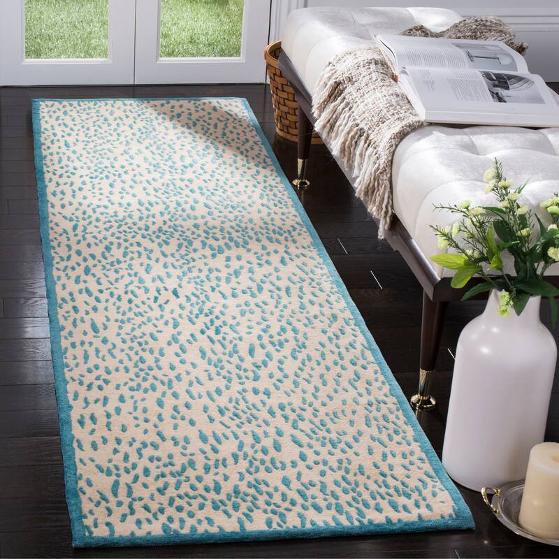SAFAVIEH Handmade Marbella Goril Modern Polyester Rug