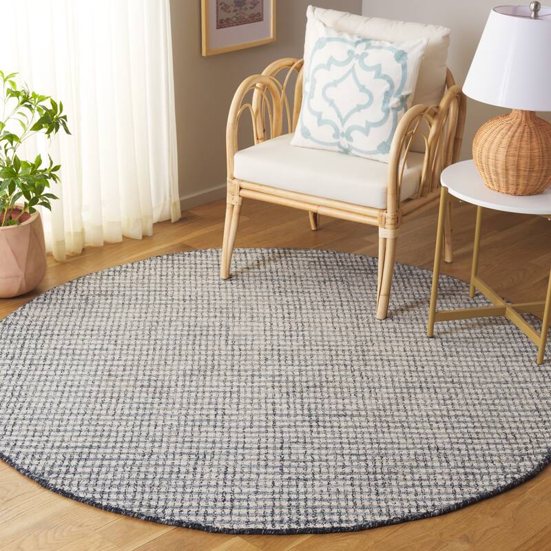 SAFAVIEH Handmade Abstract Daina Modern & Contemporary Wool Rug - 6' Round - Ivory/Black