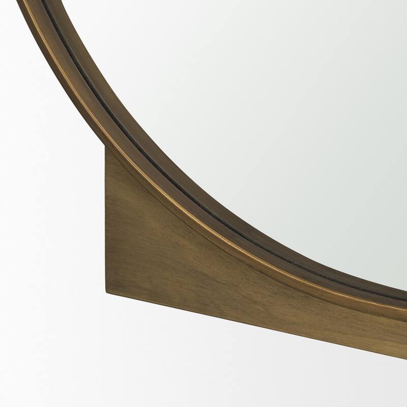 Tillie is a round mirror with a brushed gold metal frame. - 36.0L x 1.8W x 37.5H