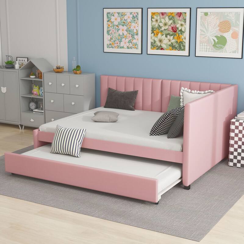 Upholstered sofa bed with trundle