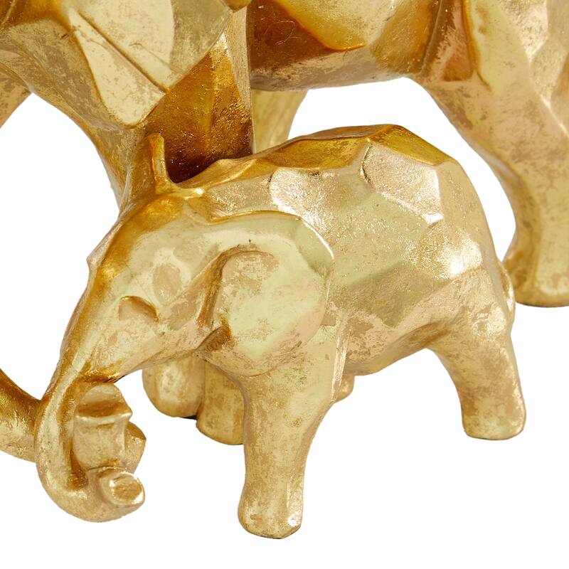 CosmoLiving by Cosmopolitan Gold Polystone Elephant Decorative Sculpture - 7 x 10 x 8