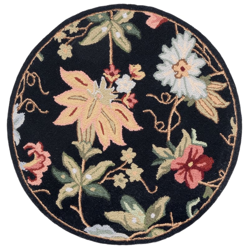 SAFAVIEH Handmade Chelsea Rubi French Country Floral Wool Rug - 6' x 9' Oval - Black - Oval