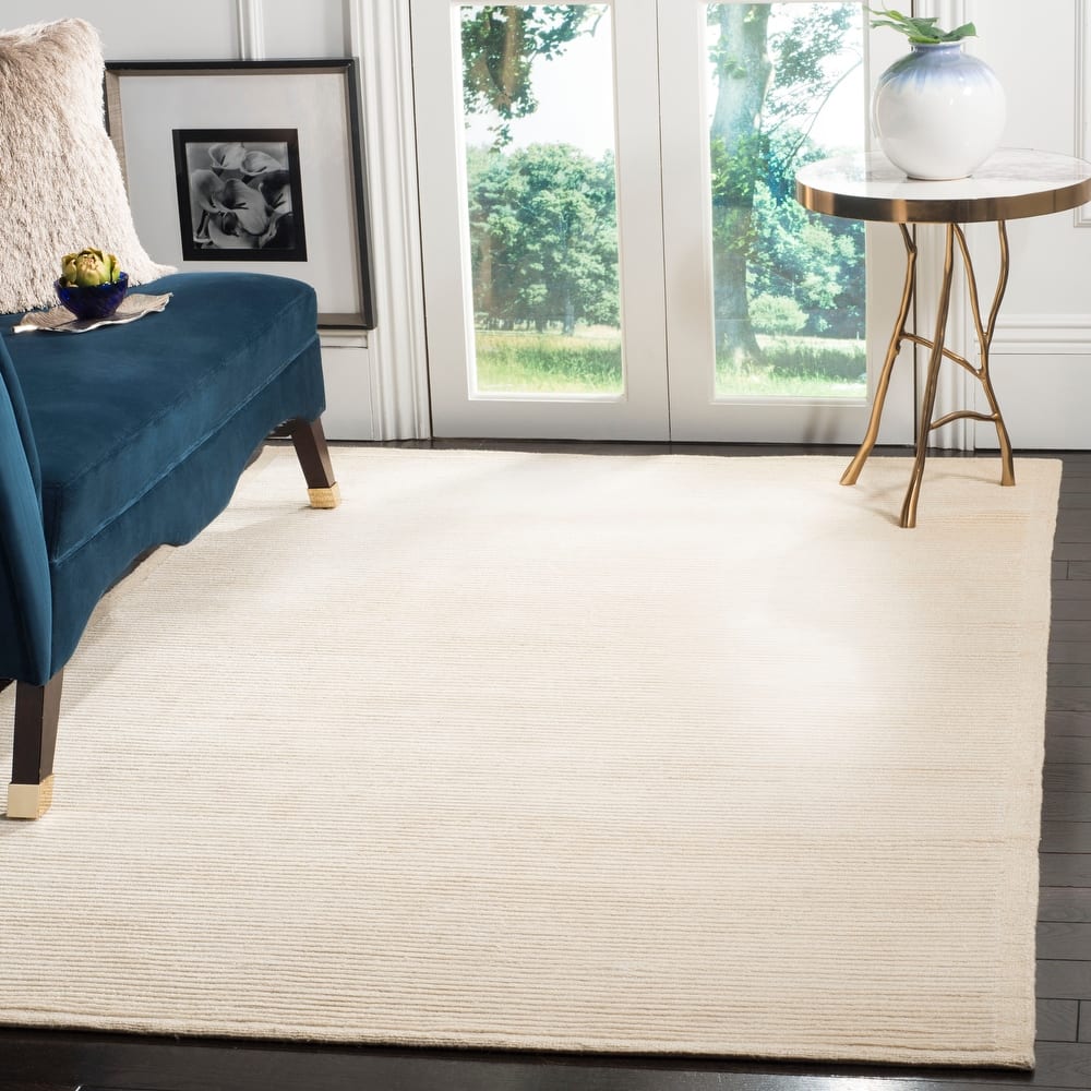 SAFAVIEH Couture Hand-knotted Tibetan Lirio Modern Wool Rug