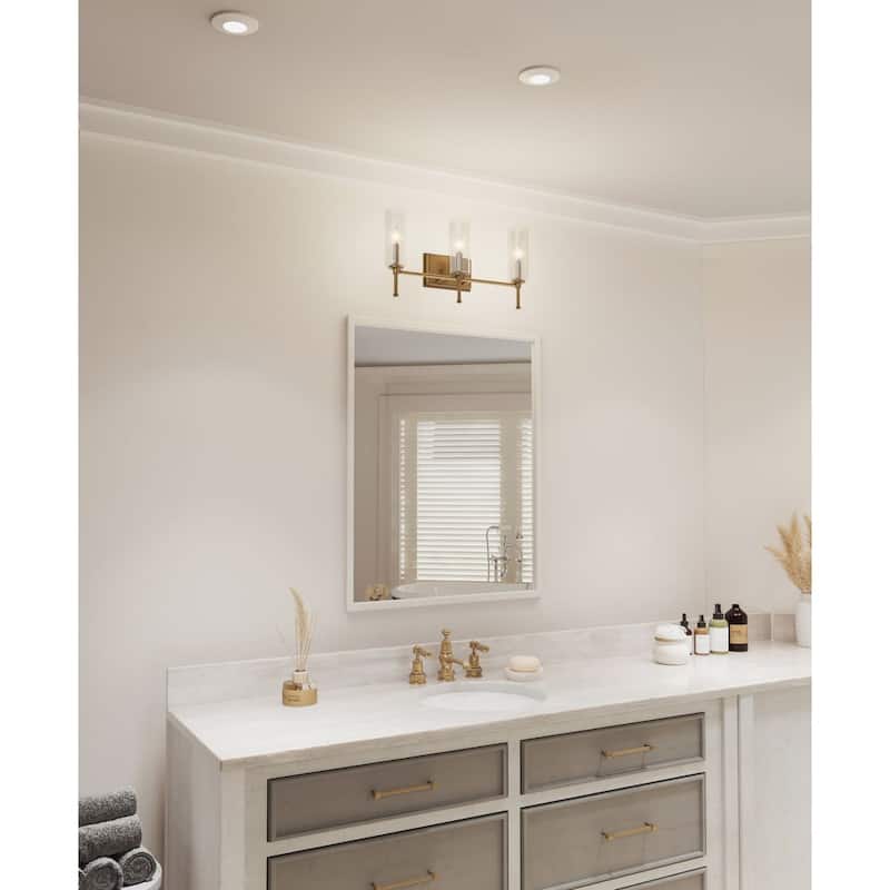 Elara Collection 3-light Vintage Brass Clear Glass Bath Vanity Light - 22.125 in x 5.12 in x 11.5 in