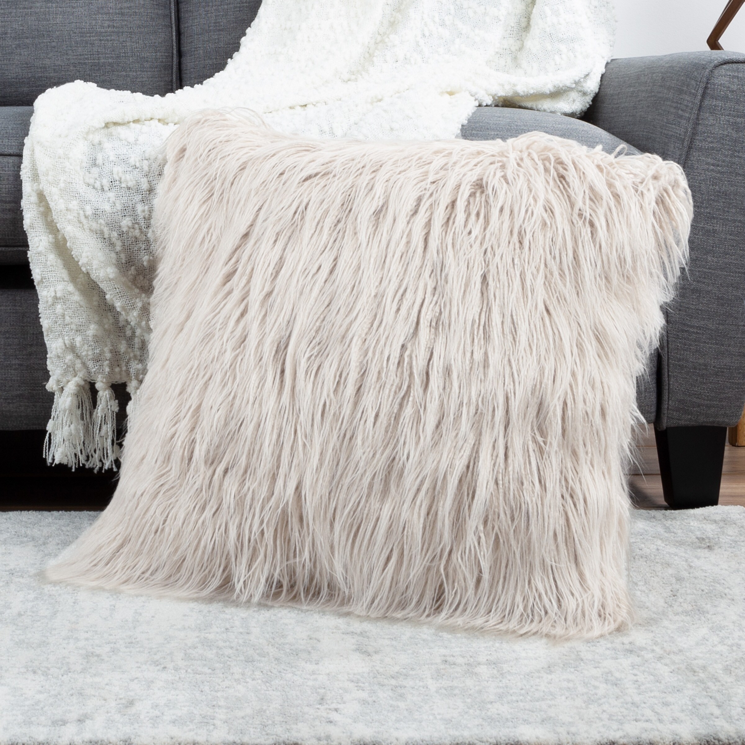 https://ak1.ostkcdn.com/images/products/is/images/direct/d04f6ced3eeb1efb5200e4c08087fca350a26a2b/Hastings-Home-22%22-Mongolian-Faux-Fur-Pillow.jpg
