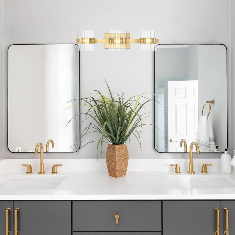 Aries 24.25 in. 3-Light Brushed Gold Transitional Vanity Light with Ribbed Glass Shades