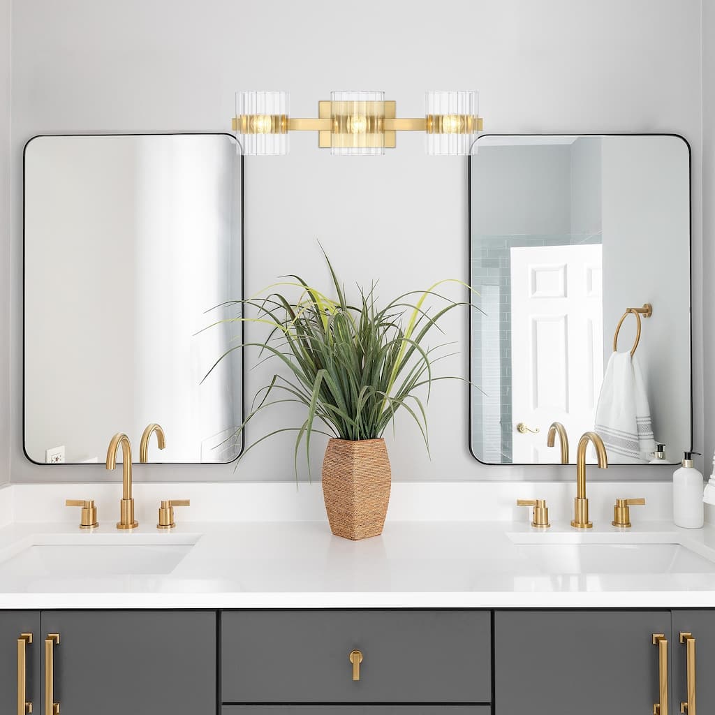 Aries 24.25 in. 3-Light Brushed Gold Transitional Vanity Light with Ribbed Glass Shades
