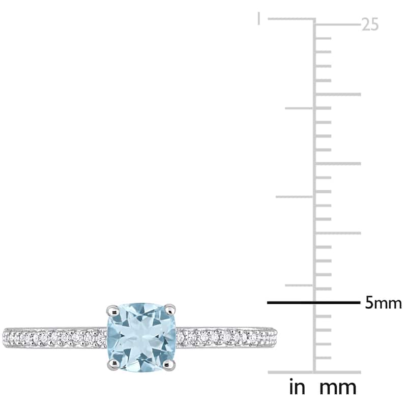 Miadora 10k White Gold Cushion-cut Blue Topaz and 1/10ct TDW Diamond Birthstone Ring