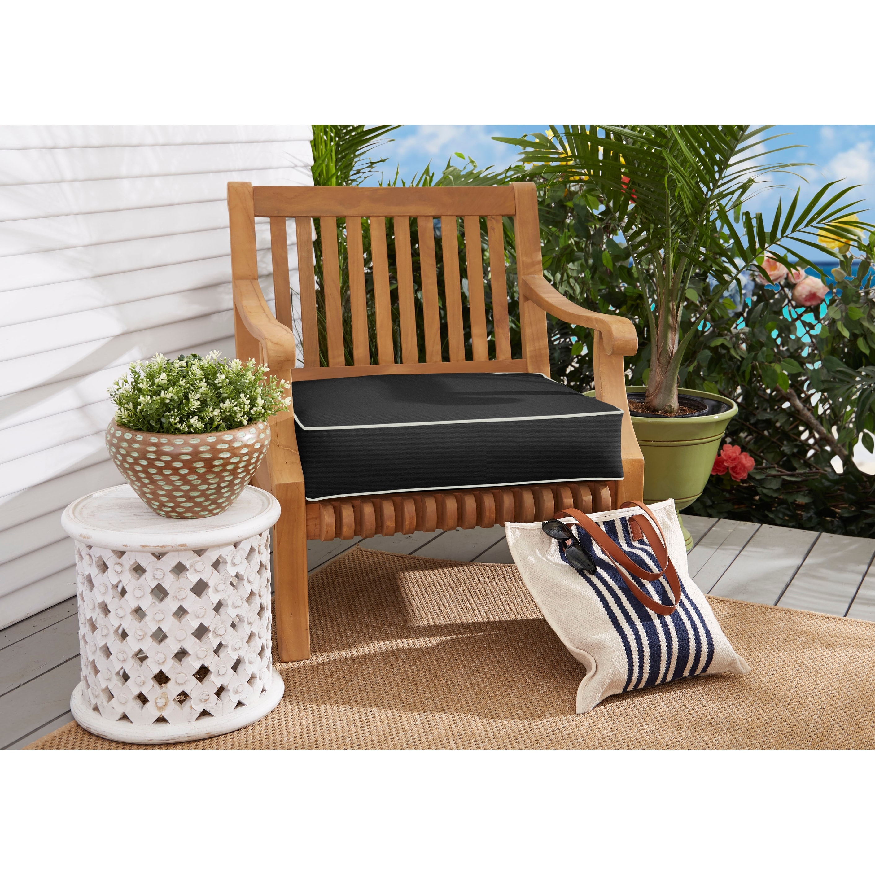 Mattress with dimensions 27 inches by 23 inches by 5 inches, outlined dimensions on a white background