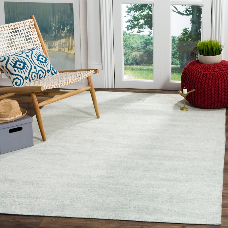 SAFAVIEH Hand-knotted Stone Wash Janina Modern Wool Rug - 8' x 10' - Light Blue