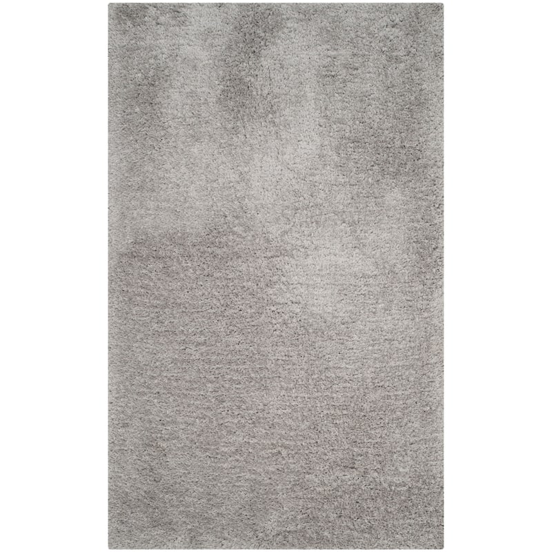SAFAVIEH Handmade Ryann Shag Anneclaar Solid Polyester Rug