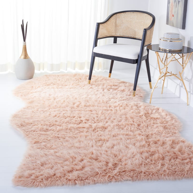 SAFAVIEH, Faux Sheep Idith Shona 2.4-inch Thick Rug - 5' x 8' - Light Pink