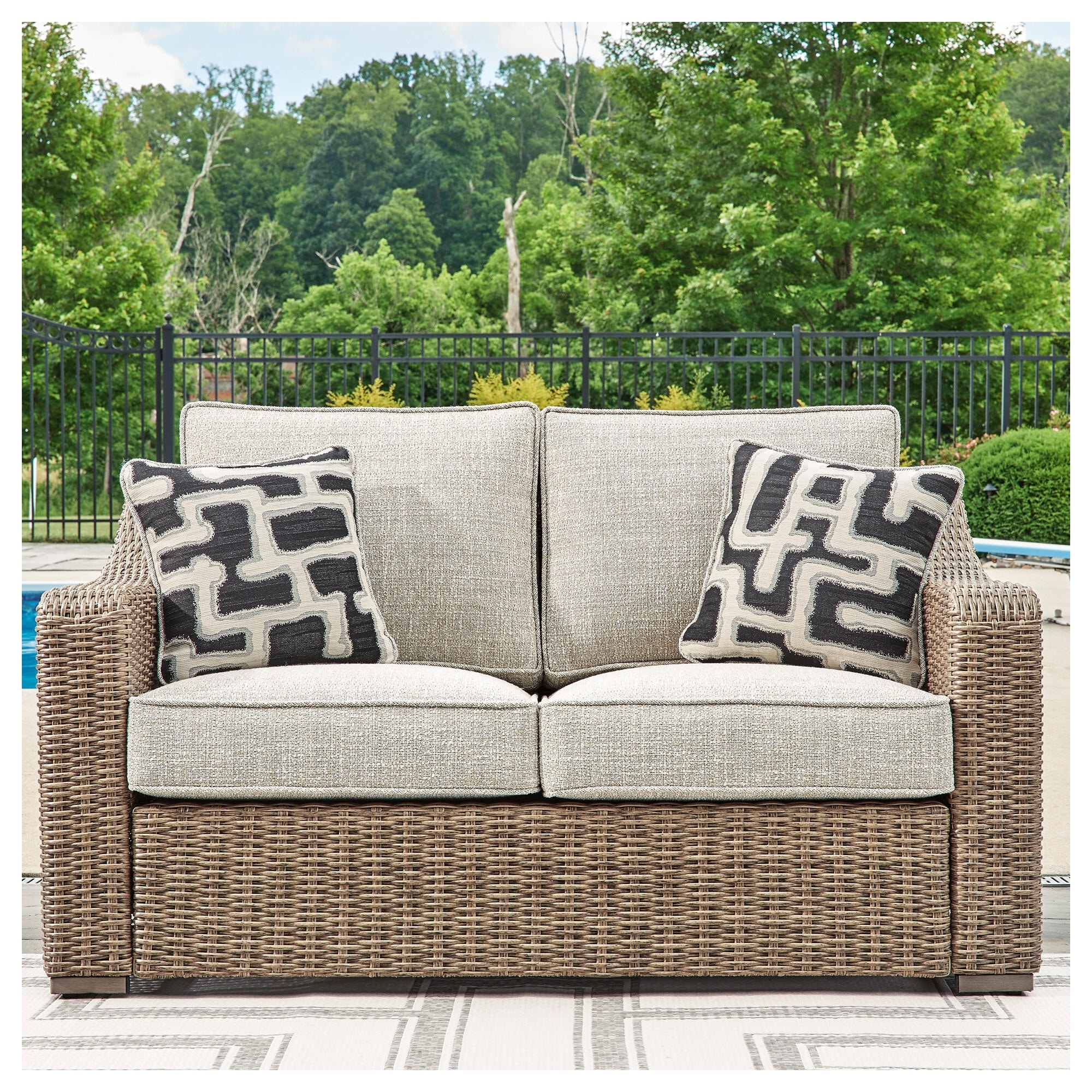 Signature Design by Ashley Beachcroft Beige Outdoor Loveseat