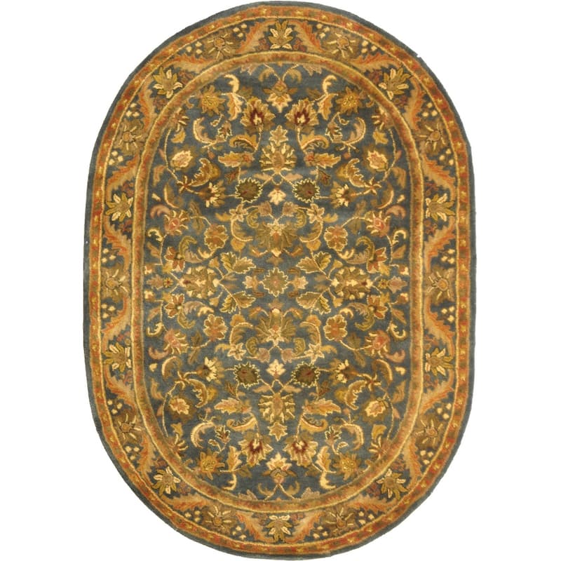 SAFAVIEH Handmade Antiquity Manerva Traditional Oriental Wool Rug - 4'6" x 6'6" Oval - Blue/Gold
