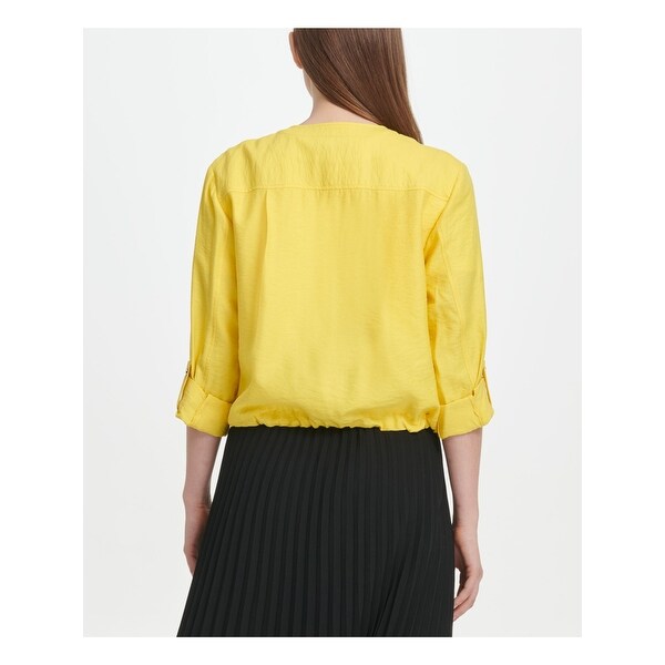 yellow zip up sweater