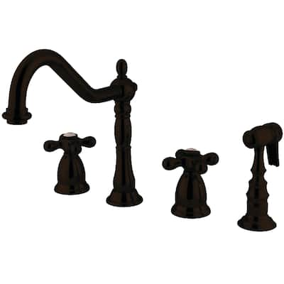Kingston Brass Heritage Deck Mount Widespread Kitchen Faucet with Brass Sprayer