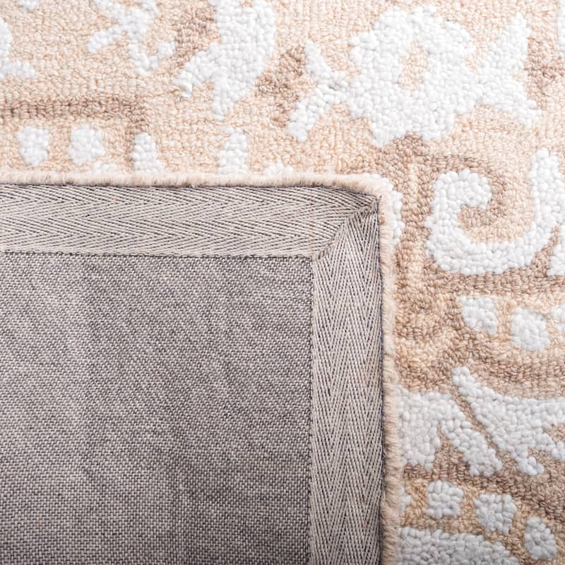 SAFAVIEH Handmade Abstract Kiyomi Medallion Wool Rug
