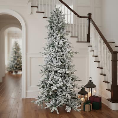 HomeRoots 8' Slender Flocked Pine Christmas Tree - Green/White - 50.00 in. x 96.00 in. x 50.00 in.