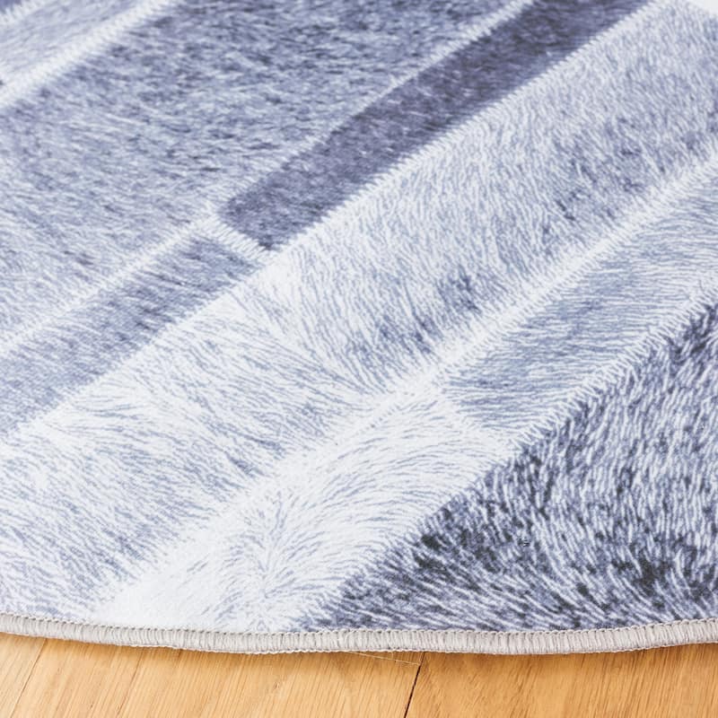 SAFAVIEH Faux Hide Machine Washable Slip Resistant Katalina Modern