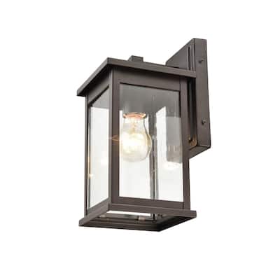Millennium Lighting Bowton 1 Light Outdoor Wall Sconce in Powder Coat Bronze with a Clear Glass Shade