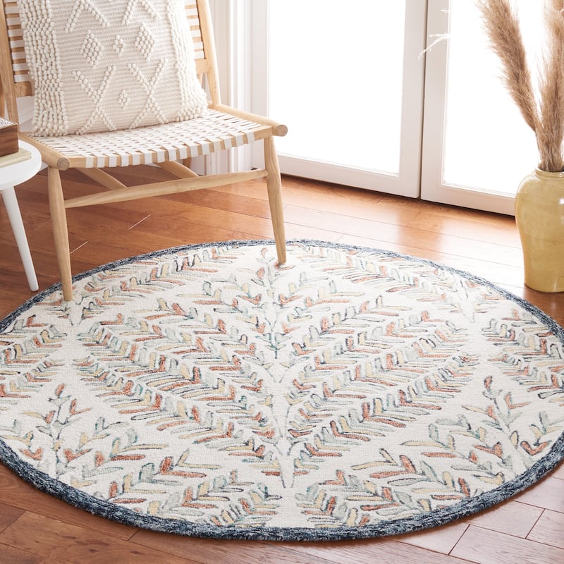 SAFAVIEH Handmade Capri Ilianka Wool Rug - 7' Round - Ivory/Green - Round