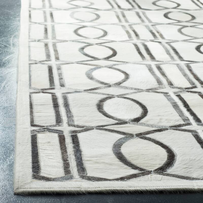 SAFAVIEH Handmade Studio Leather Mandie Modern Leather Rug