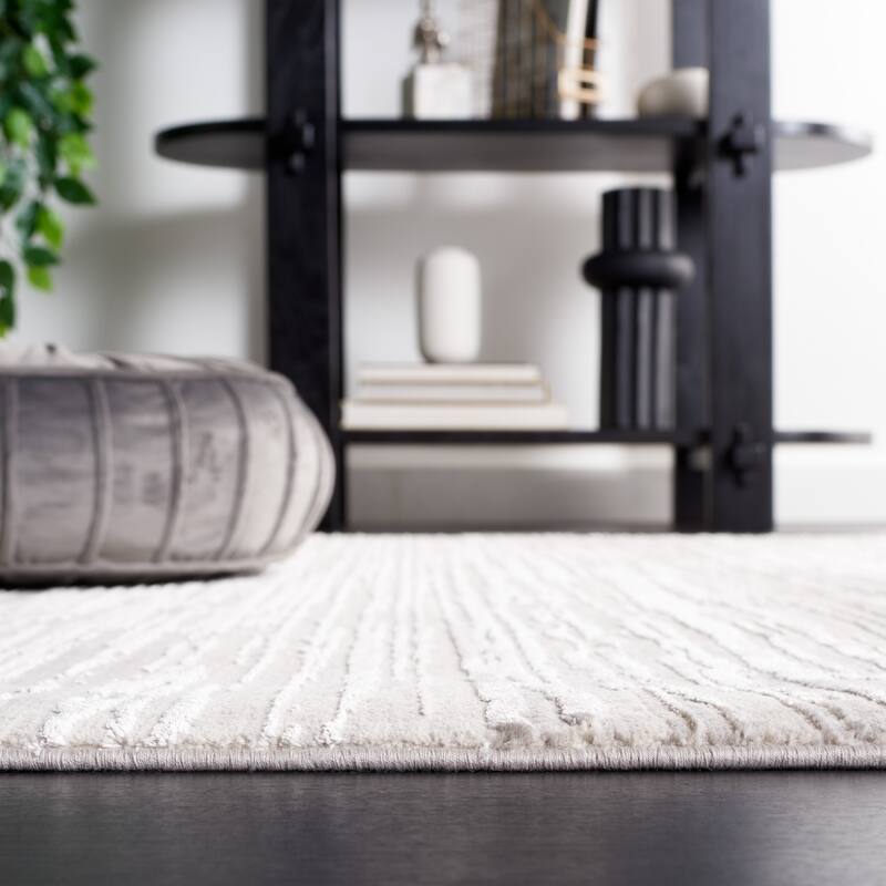 SAFAVIEH Diamond Einfrid Modern Abstract Fringe Rug