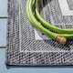 SAFAVIEH Courtyard Vickie Indoor/ Outdoor Waterproof Patio Backyard Rug - 2'7" x 5' - Ivory/Black