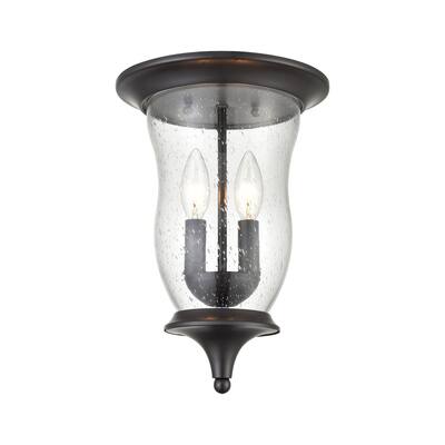 Trinity Series Outdoor Flush Mount in Oil Rubbed Bronze with Seeded Glass