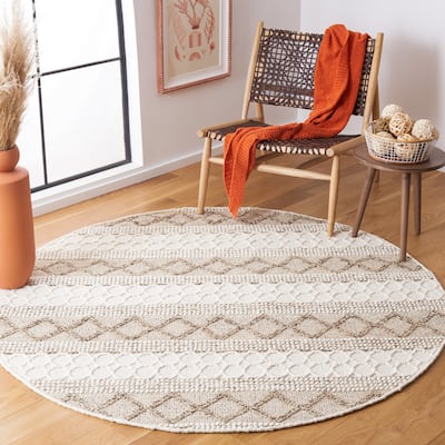 SAFAVIEH Handmade Natura Ifat Wool Braided Tassel Rug