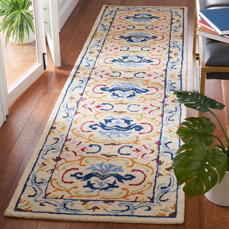 SAFAVIEH Handmade Micro-Loop Sinela Wool Rug - 2'3" x 9' Runner - Beige/Blue
