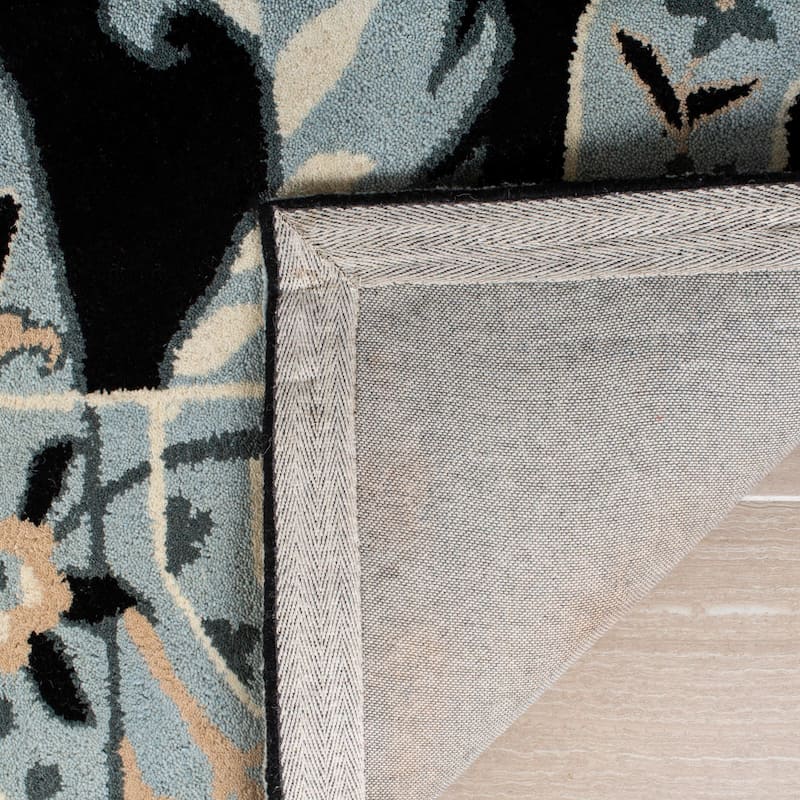 SAFAVIEH Handmade Wyndham Rosaleen Modern Wool Rug