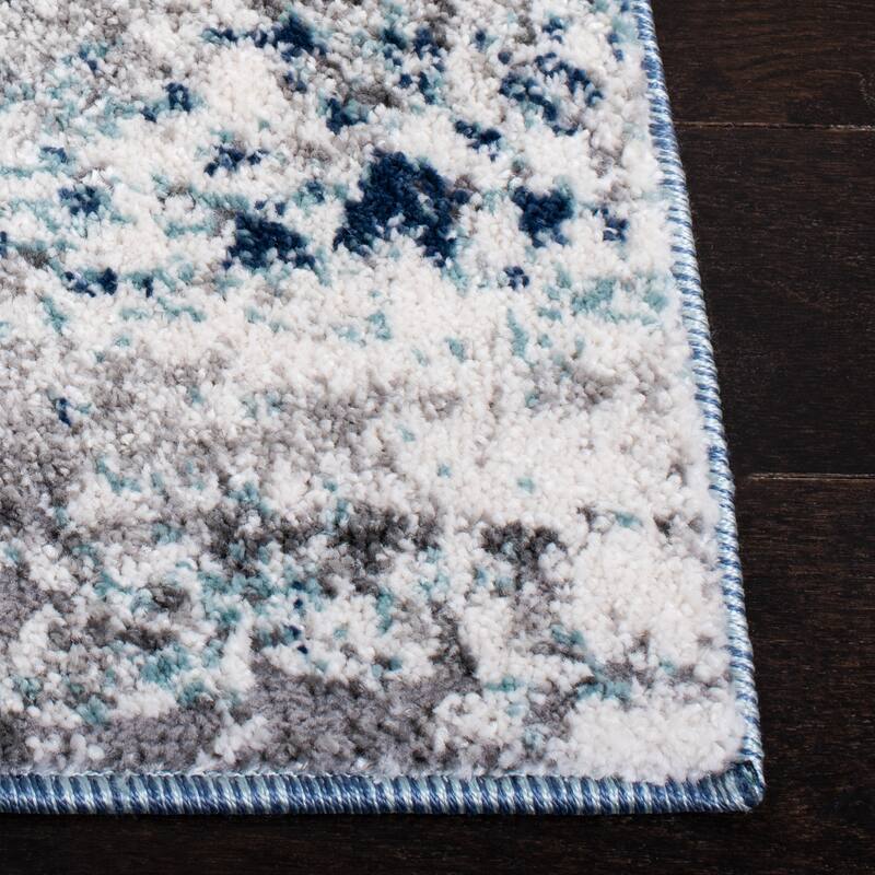 SAFAVIEH Aston Sarit Modern Abstract Rug
