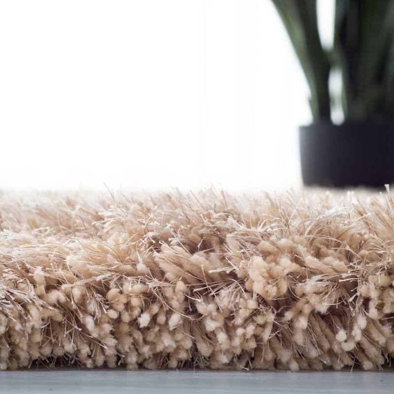 SAFAVIEH Handmade Alvilde Shag Etha Shag Solid Polyester Rug