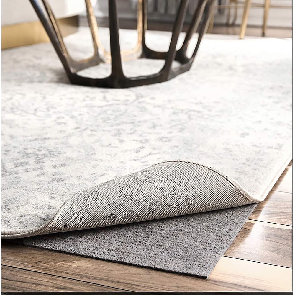 https://ak1.ostkcdn.com/images/products/is/images/direct/d2f540d898dbeb0172e4b0c0215dad7e93126578/Thick-Grey-Non-slip-Noise-reducing-Rug-Pad-for-Hardwood-Floors.jpg