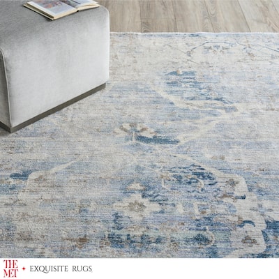 The Met X Exquisite Rugs Vintage Looms Light Blue/Beige Area Rug.