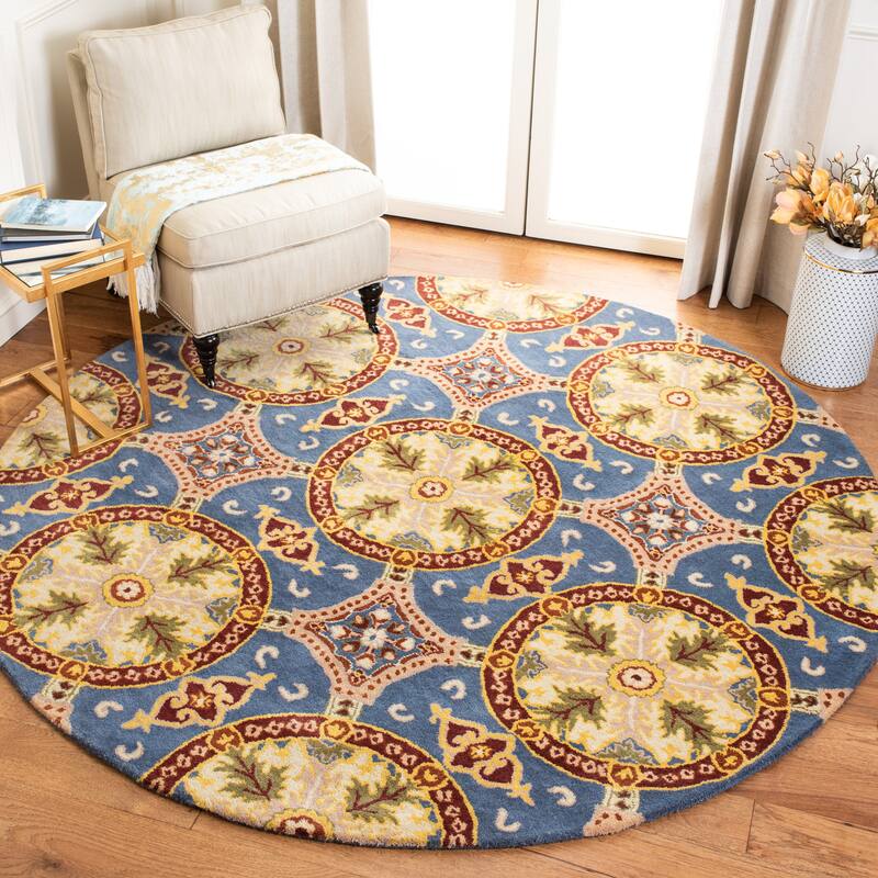 SAFAVIEH Handmade Wyndham Nisa Modern Wool Rug - 7' Round - Blue/Gold