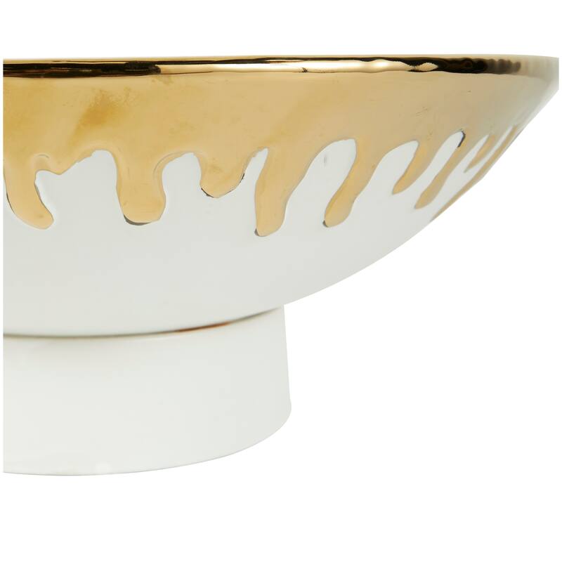CosmoLiving by Cosmopolitan Black or White Ceramic Decorative Bowl with Abstract Gold Melting Drips