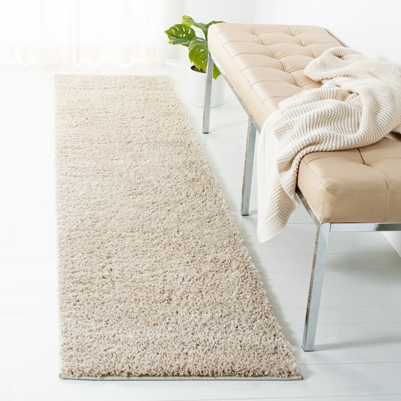 SAFAVIEH August Shag Mevlude Solid 1.25-inch Thick Rug - 2' x 8' Runner - Beige