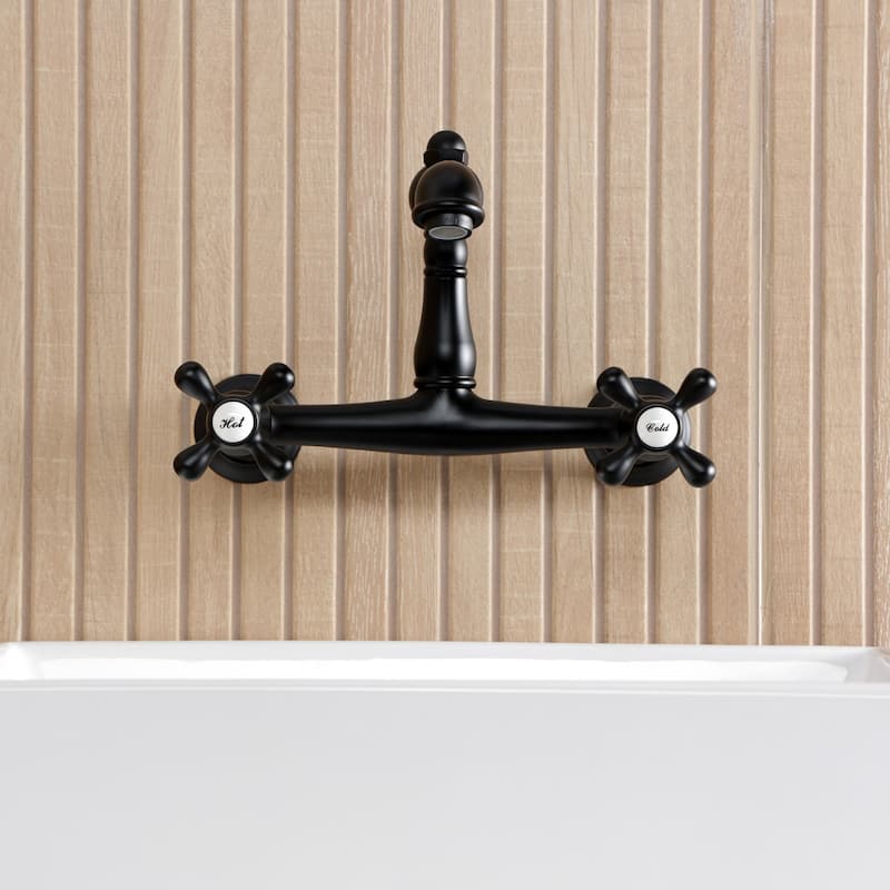 Kingston Brass English Country Two-Handle 2-Hole Wall Mount Bathroom Faucet