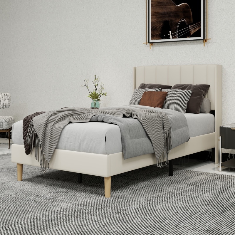 Caxkun Upholstered Platform Bed Frame with Wingback headboard.