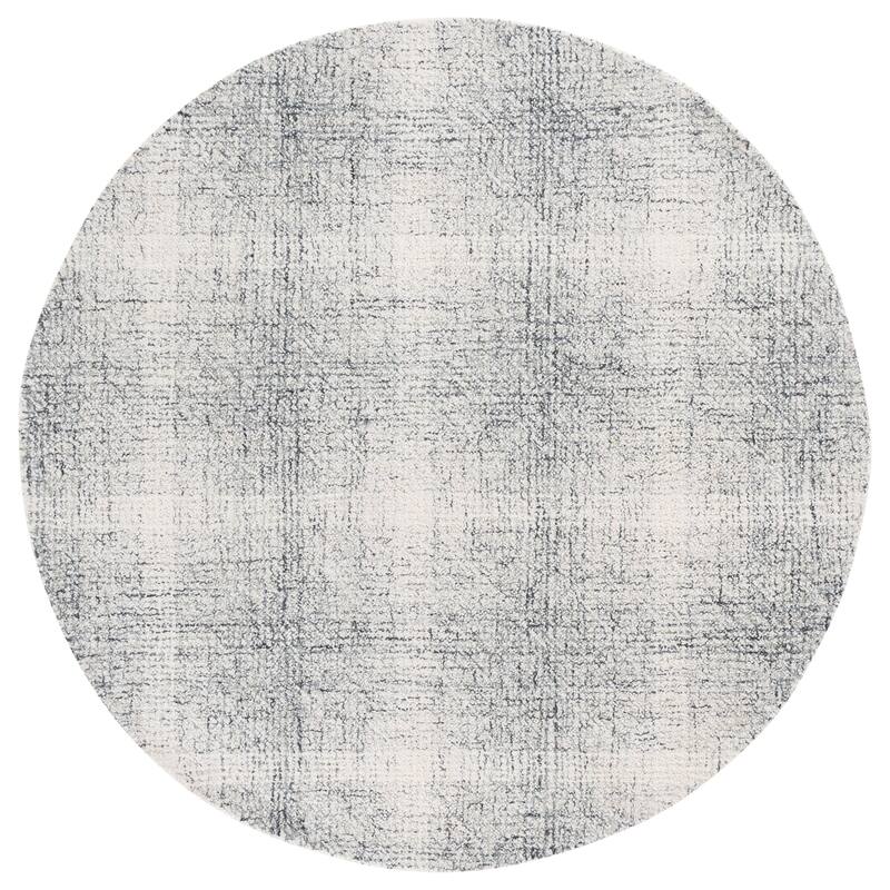 SAFAVIEH Handmade Abstract Izeta Wool Rug - Ivory/Black - 6' Round